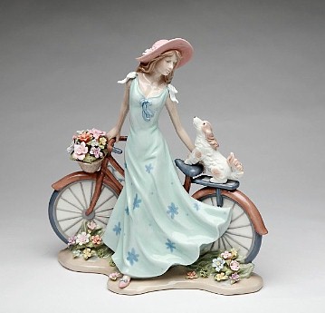 Porcelain Lady with Bicycle Figurine 