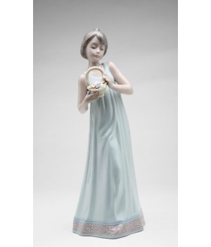 Girl Holding Basket of Flowers Porcelain Figurine